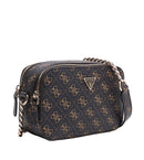 A Guess crossbody camera bag in black coated canvas with a gold monogram pattern, featuring a gold-tone chain strap, silver-tone zippers, and a gold Guess logo triangle plaque on the front.