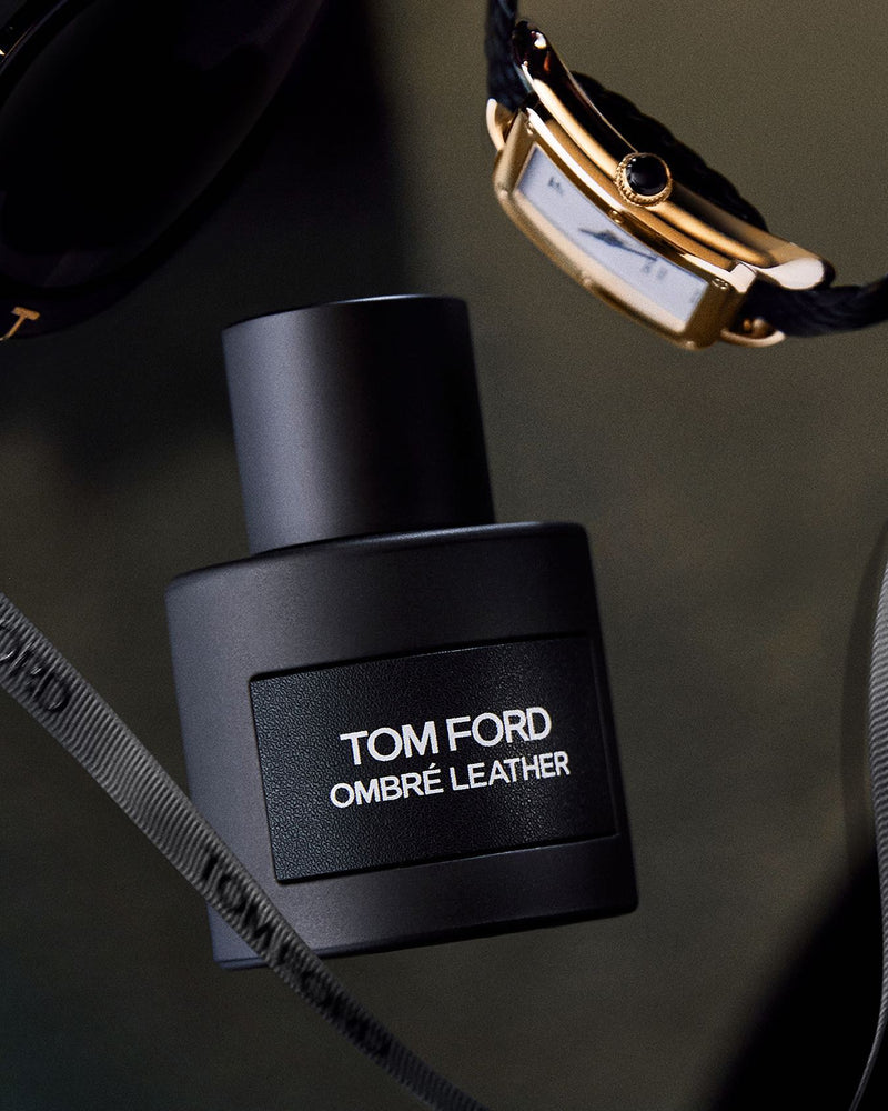 Sleek black bottle of Tom Ford Ombre Leather EDP, 100ml of smoky leather infused with cardamom and jasmine. Shop now at xpressions.ae.