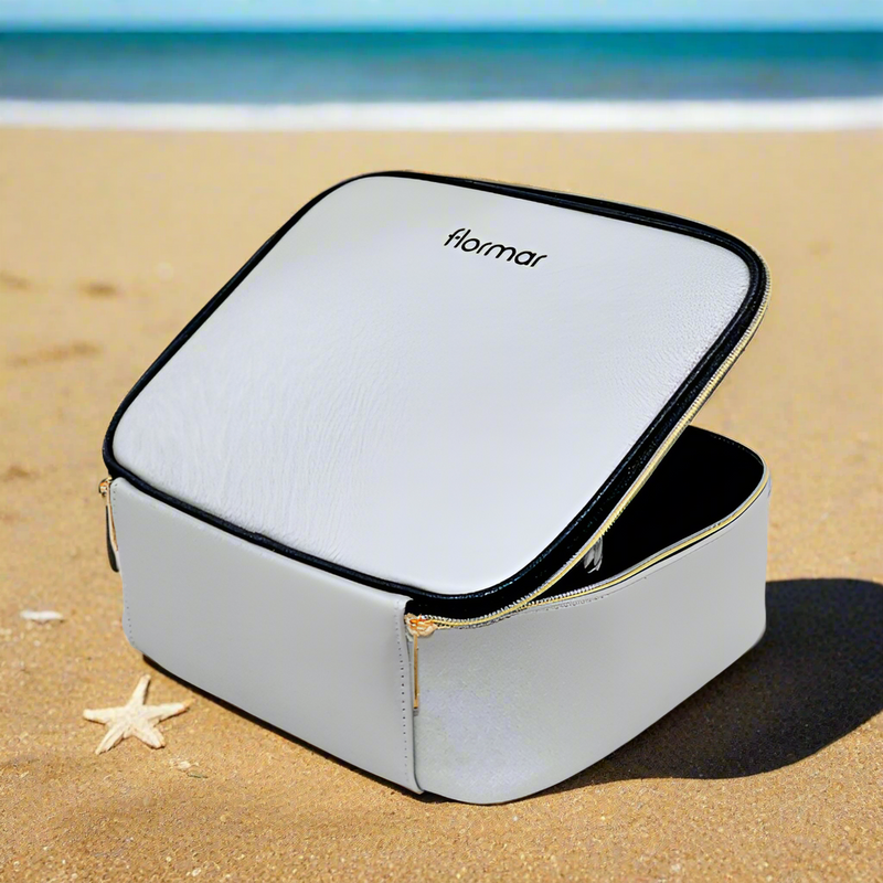 Silver jewelry box with black interior on a white background
